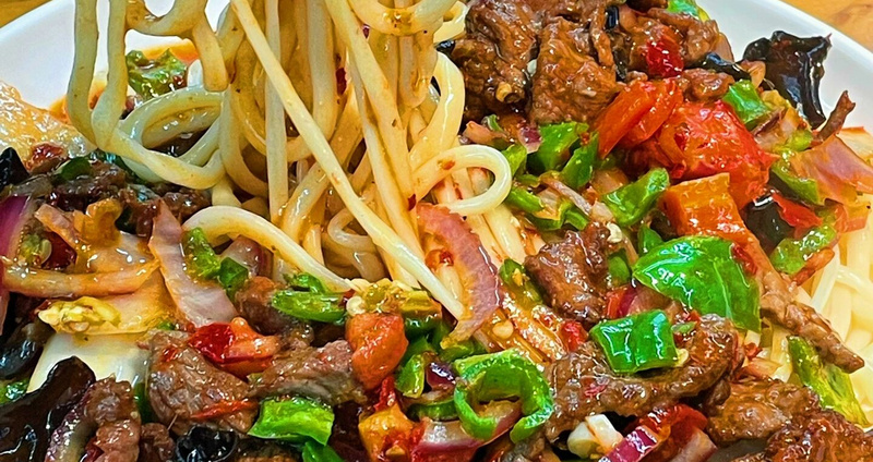 Xinjiang's Signature Dish: Pulled Noodles with Sauce